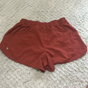 Two pairs of Old Navy Mid-Rise StretchTech Run Shorts -- 3-inch inseam